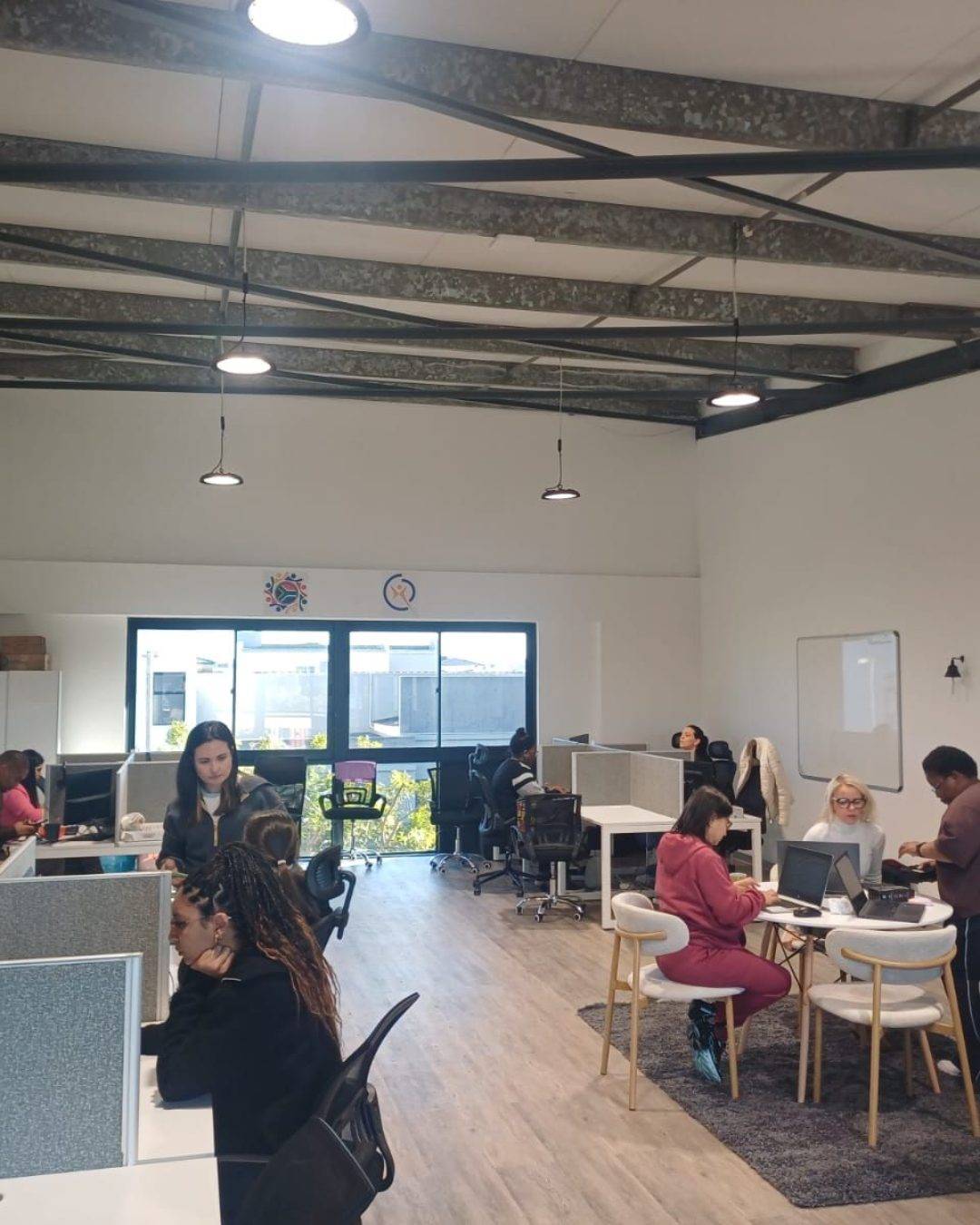 The Vertrou team working at desks in a Cape Town office